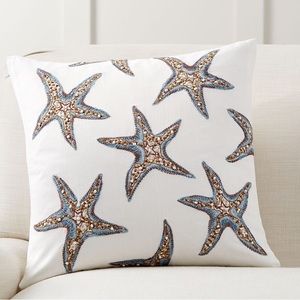 Set of two Pottery Barn Starfish Embroidered Pillow Covers.